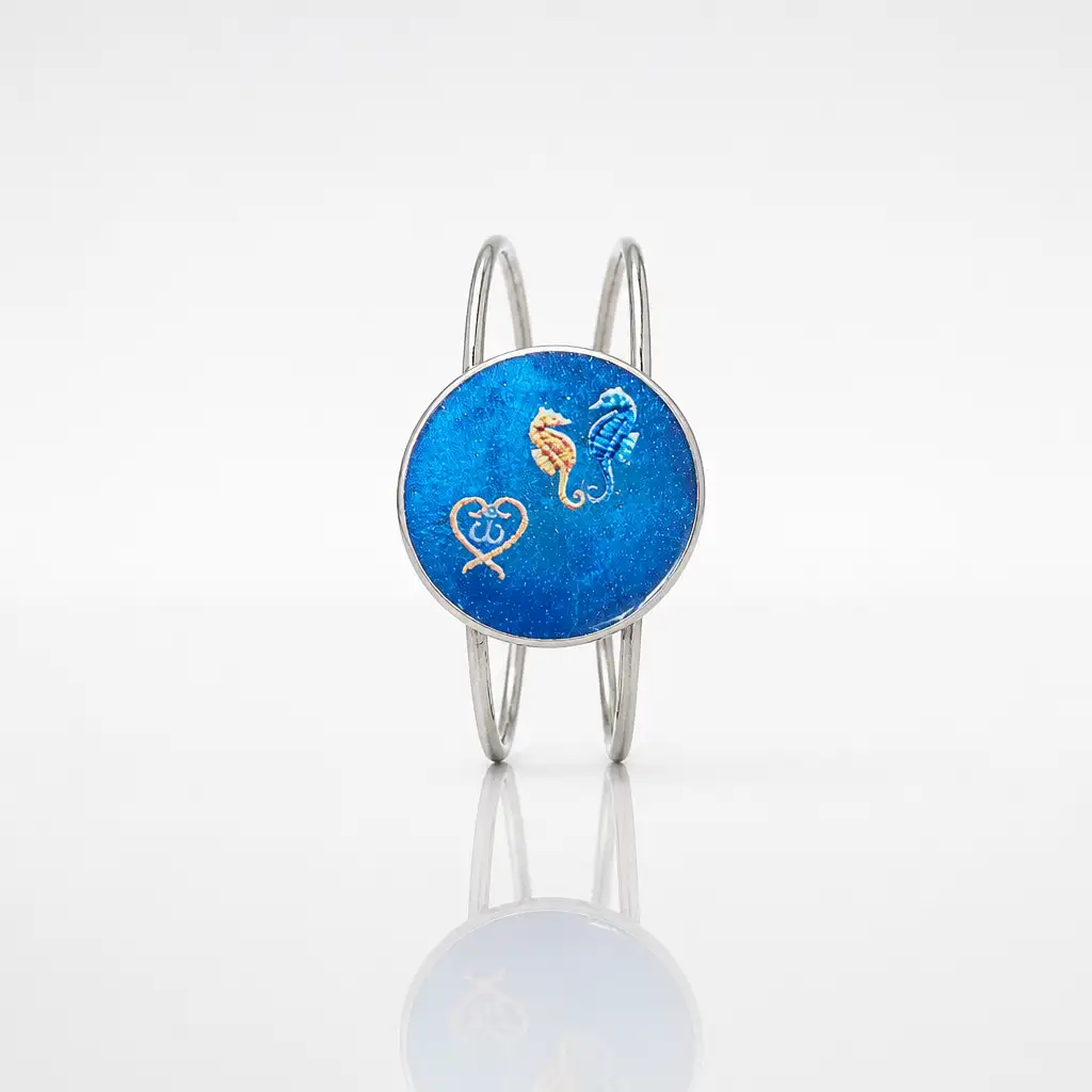 Bracelet artisanal hippocampes en acier inoxydable et résine bleue